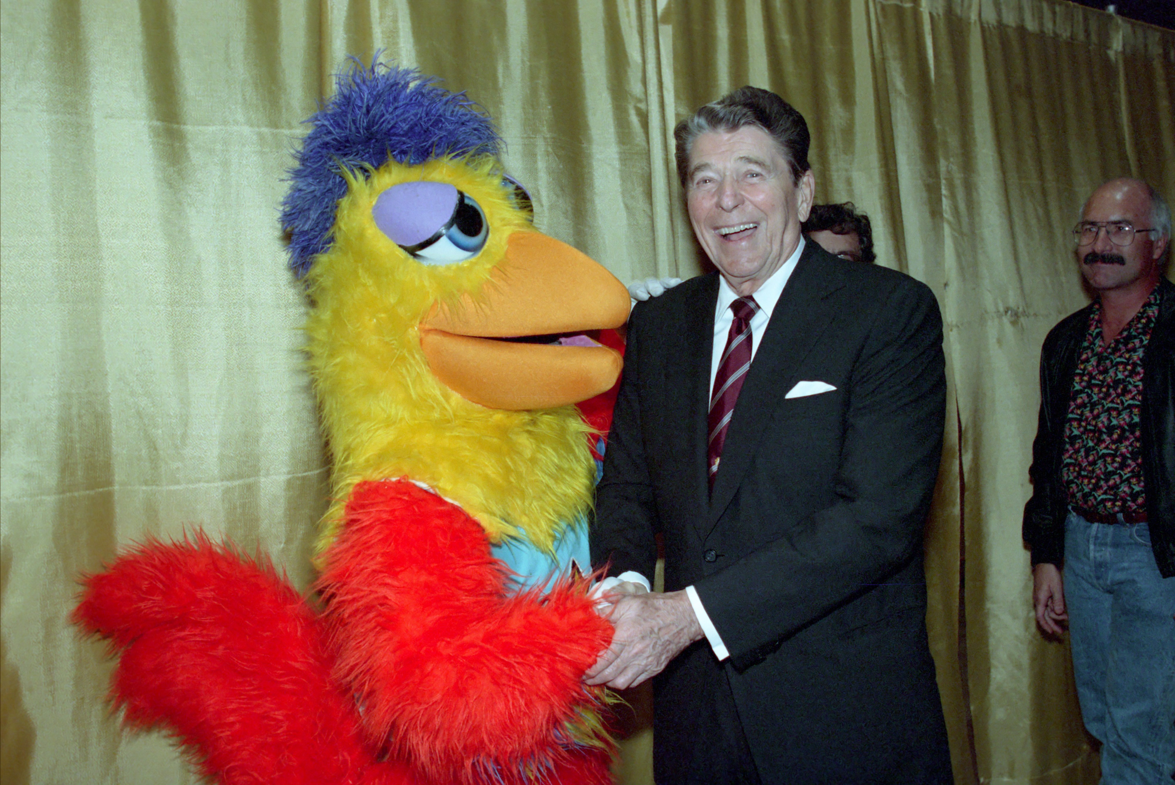 The Famous San Diego Chicken poses with President Ronald Reagan at the San Diego Convention Center, 1988.